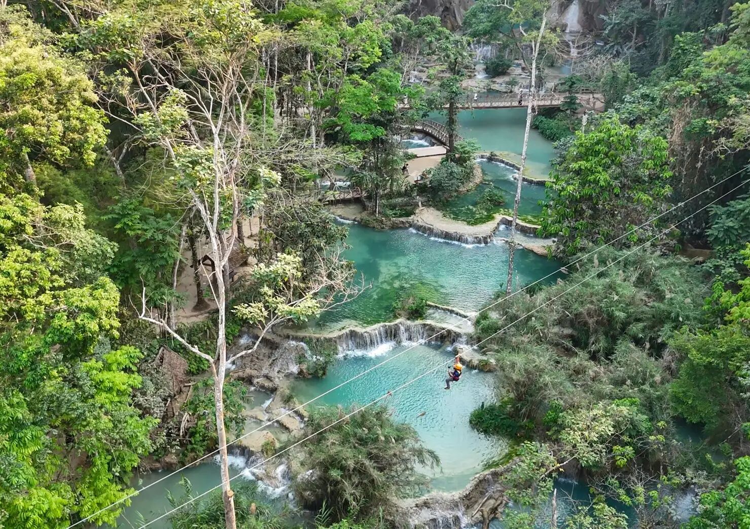 Descend misty waterfalls in Laos’ lush paradise